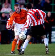 20 January 2002; Kenny Ennis  of St Kevin's Boys in action against Tommy McCallion and Gareth McGlynn of Derry City during the FAI Carlsberg Cup Third Round Replay match between Derry City and St Kevin's Boys at The Brandywell in Derry. Photo by David Maher/Sportsfile