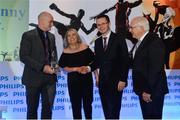 7 December 2016; Siobhán Kenny is presented with the Philips Manager of the Year award 2016 on behalf of her husband Stephen Kenny by Dave Nicholl, CEO and president of Philips lighting UK and Ireland, Minister of State for Tourism and Sport Patrick O'Donovan T.D. and Cel O'Reilly, Managing Director of Philips lighting UK and Ireland in attendance at the Philips Lighting Sports Manager of the Year 2016 at The Intercontinental Hotel in Dublin. Photo by Eóin Noonan/Sportsfile
