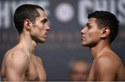 9 December 2016; Scott Quigg, left, and Jose Cayetano square off during the official weigh-in at the Victoria Warehouse in Manchester prior to the Anthony Joshua v Eric Molina fight card at the Manchester Arena in Manchester, England. Photo by Stephen McCarthy/Sportsfile