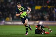 9 December 2016; Garry Ringrose of Leinster escapes the tackle from Luther Burrell of Northampton Saints during the European Rugby Champions Cup Pool 4 Round 3 match between Northampton Saints and Leinster at Franklin's Gardens in Northampton, England. Photo by Stephen McCarthy/Sportsfile