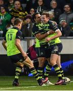 9 December 2016; Rory O'Loughlin of Leinster, right, is congratulated by his team mates Garry Ringrose, left, and Isa Nacewa after scoring his side's third try during the European Rugby Champions Cup Pool 4 Round 3 match between Northampton Saints and Leinster at Franklin's Gardens in Northampton, England. Photo by Stephen McCarthy/Sportsfile