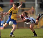30 April 2011; Cliodhna McHugh, Roscommon, in action against Carole Finch, Westmeath. Bord Gais Energy National Football League Division Four Final, Westmeath v Roscommon, Cusack Park, Ennis, Co. Clare. Picture credit: David Maher / SPORTSFILE