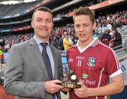 1 May 2011; Mark Hehir, Galway, is presented with his Cadbury Hero of the Match Award from Shane Guest, Senior Brand Manager, Cadbury Ireland. Cadbury GAA All-Ireland Football U21 Championship Final, Cavan v Galway, Croke Park, Dublin. Picture credit: David Maher / SPORTSFILE