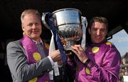 3 May 2011; Owner Patrick Redmond and Jockey Barry Geraghty, right, with the cup after winning the Boylesports.com Champion Steeplechase with Big Zeb. Punchestown Irish National Hunt Festival 2011, Punchestown, Co. Kildare. Picture credit: Barry Cregg / SPORTSFILE