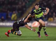 9 December 2016; Garry Ringrose of Leinster is tackled by Luther Burrell of Northampton Saints during the European Rugby Champions Cup Pool 4 Round 3 match between Northampton Saints and Leinster at Franklin's Gardens in Northampton, England. Photo by Stephen McCarthy/Sportsfile
