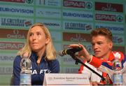 10 December 2016; Andrew Butchart of Great Britain fixes the position of the microphone for Karoline Bjerkeli Grøvdal of Norway during a press conference ahead of the 2016 Spar European Cross Country Championships in Chia, Italy. Photo by Eóin Noonan/Sportsfile
