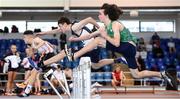 10 December 2016; Troy McVonville, right, of Ireland, from Craigavon S High School competes in the Under 16 Boys 60m hurdles alongside Alexander Mackay of Scotland, from Dingwall Academy, during the Under16 Boys 60m hurdles at the Combined Events Schools International games at Athlone IT in Co. Westmeath. Photo by Cody Glenn/Sportsfile