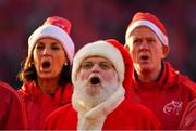 10 December 2016; Santa Clause sings &quot;Stand Up and Fight&quot; alongside the Munster Choir ahead of the European Rugby Champions Cup Pool 1 Round 3 match between Munster and Leicester Tigers at Thomond Park in Limerick. Photo by Brendan Moran/Sportsfile