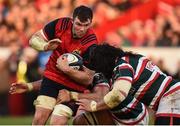 10 December 2016; Peter O'Mahony of Munster is tackled by Graham Kitchener and Logovii Mulipola of Leicester Tigers during the European Rugby Champions Cup Pool 1 Round 3 match between Munster and Leicester Tigers at Thomond Park in Limerick. Photo by Diarmuid Greene/Sportsfile