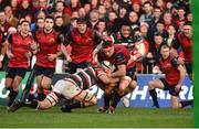 10 December 2016; CJ Stander of Munster is tackled by Michael Fitzgerald and Logovii Mulipola of Leicester Tigers during the European Rugby Champions Cup Pool 1 Round 3 match between Munster and Leicester Tigers at Thomond Park in Limerick. Photo by Diarmuid Greene/Sportsfile