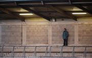 10 December 2016; A lone spectator watches on from the terrace during the GAA Interprovincial Football Championship Semi-Final between Connacht and Leinster at Parnell Park in Dublin. Photo by Daire Brennan/Sportsfile
