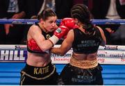 10 December 2016; Katie Taylor, left, exchanges punches with Viviane Obenauf during their Super-Featherweight fight at the Manchester Arena in Manchester, England. Photo by Stephen McCarthy/Sportsfile