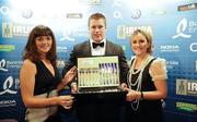 4 May 2011; Sean O'Brien, of Leinster, is presented with the Bord Gáis Energy IRUPA Supporters Player of the Year, as voted by the listeners of Newstalk 106-108FM, by Irene Gowing, left, of Bord Gáris Energy and Emma Gavagan, Head of Marketing, Newstalk 106-108FM, at the Bord Gáis Energy IRUPA Players Awards. Burlington Hotel, Dublin. Picture credit: Brendan Moran / SPORTSFILE