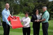5 May 2011; Munster captain and Irish rugby legend Paul O'Connell shows his support to the European Solheim Cup team by presenting European Captain, Alison Nicholas with a signed Munster jersey alongside Solheim Cup Director Shane Daly and Castletroy Golf Club Lady captain Jackie Leahy with the Solheim Cup. The 2011 Solheim Cup will take place on the stunning Jack Nicklaus Signature Course in Killeen Castle, County Meath, from 23-25 September 2011. The professional ladies golf event between Europe and the USA is the most prestigious international team event in women’s professional golf and one of the biggest international sporting events to be staged in Ireland this year. Visit www.solheimcup.com for ticketing information. Castletroy Golf Club, Golf Links Road, Castletroy, Co. Limerick. Picture credit: Matt Browne / SPORTSFILE
