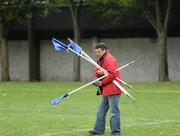 7 May 2011; Anto Brennan carries out the flags before the game. U9 A Saturday - 7 a-side,  Belvedere F.C. v Phoenix F.C., Fairview Park, Fairview, Dublin. Picture credit: Ray McManus / SPORTSFILE
