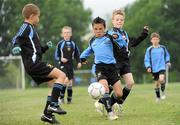 7 May 2011; Sean Brennan, Belvedere F.C., in action against Robert Linguaru, left, and Ben Donovan, Phoenix F.C.. U9 A Saturday - 7 a-side,  Belvedere F.C. v Phoenix F.C., Fairview Park, Fairview, Dublin. Picture credit: Ray McManus / SPORTSFILE