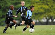 7 May 2011; Sean Brennan, Belvedere F.C., in action against Katuego Mashigo, left, and Lorcan Dunne, Phoenix F.C.. U9 A Saturday - 7 a-side,  Belvedere F.C. v Phoenix F.C., Fairview Park, Fairview, Dublin. Picture credit: Ray McManus / SPORTSFILE