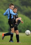 7 May 2011; Dylan Kelck, Belvedere F.C., in action against Graham Caffrey, Phoenix F.C.. U9 A Saturday - 7 a-side,  Belvedere F.C. v Phoenix F.C., Fairview Park, Fairview, Dublin. Picture credit: Ray McManus / SPORTSFILE