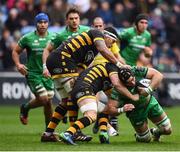 11 December 2016; John Muldoon of Connacht is tackled by Thomas Young and Nathan Hughes, left, of Wasps during the European Rugby Champions Cup Pool 2 Round 3 match between Wasps and Connacht at the Ricoh Arena in Coventry, England. Photo by Stephen McCarthy/Sportsfile