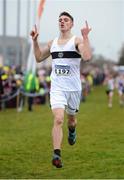 11 December 2016; Louis O'Loughlin, of Donore Harriers, Dublin, celebrates as he crosses the line as he wins the Boys U17 5000m race during the Irish Life Health Novice & Juvenile Uneven Age National Cross Country Championships at Dundalk I.T. in Co. Louth. Photo by Seb Daly/Sportsfile