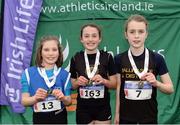 11 December 2016; Winner of the Girls U11 1500m Erín Leavy, centre, Dunleer A.C, Co. Louth, with runners up, second place Amy McCarthy, left, Bandon A.C, Co, Cork, and third place Aoibheann Fitzpatrick, right, Ballinasloe & District, Co. Galway, during the Irish Life Health Novice & Juvenile Uneven Age National Cross Country Championships at Dundalk I.T. in Co. Louth. Photo by Seb Daly/Sportsfile