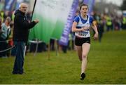 11 December 2016; Lucy Holmes, West Waterford A.C, Co. Waterford, is cheered on by Liam Hennessy, Life Vice President of Athletics Ireland, on her way to winning the Girls U15  3500m race during the Irish Life Health Novice & Juvenile Uneven Age National Cross Country Championships at Dundalk I.T. in Co. Louth. Photo by Seb Daly/Sportsfile