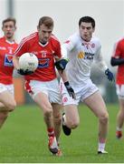 11 December 2016; Gerard McSorley of Louth in action against Michael Cassidy of Tyrone during the O'Fiaich Cup Semi Final match between Tyrone and Louth at St Oliver Plunkett Park in Crossmaglen, Armagh. Photo by Oliver McVeigh/Sportsfile