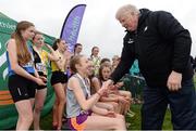 11 December 2016; Winner of the Girls U17 4000m race Abigail Taylor, Dundrum South Dublin A.C, is presented with her medal by John McGrath, Chairperson of the Juvenile Committee Athletics Ireland, during the Irish Life Health Novice & Juvenile Uneven Age National Cross Country Championships at Dundalk I.T. in Co. Louth. Photo by Seb Daly/Sportsfile