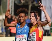 11 December 2016; Carlos Mayo, right, of Spain and Yemanerberhan Crippa of Italy celebrate after coming second and third place respectively in the under 23 mens race at 2016 Spar European Cross Country Championships in Chia, Italy. Photo by Eóin Noonan/Sportsfile