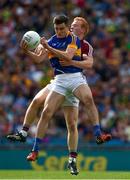 31 July 2016; Michael Quinlivan of Tipperary in action against Declan Kyne of Galway during the GAA Football All-Ireland Senior Championship Quarter-Final match between Galway and Tipperary at Croke Park in Dublin. Photo by Ray McManus/Sportsfile