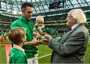 31 August 2016; The President of Ireland Michael D. Higgins presents Robbie Keane of Republic of Ireland with his 146th International Cap during the Three International Friendly game between the Republic of Ireland and Oman at the Aviva Stadium in Lansdowne Road, Dublin. Photo by David Maher/Sportsfile