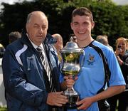 8 May 2011; Belvedere FC captain Darragh Lenihan is presented with the Paul McGrath cup by DDSL chairman Tommy Heffernan. Dublin and District Schoollboys League Finals, Paul McGrath Cup Final, Belvedere FC v St Joseph's Boys FC, A.U.L. Complex, Clonshaugh, Dublin. Picture credit: Ray McManus / SPORTSFILE
