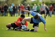 8 May 2011; Joseph's Boys FC goalkeeper Timmy O'Driscoll saves at the feet of John Murray, Belvedere FC. Dublin and District Schoollboys League Finals, Paul McGrath Cup Final, Belvedere FC v St Joseph's Boys FC, A.U.L. Complex, Clonshaugh, Dublin. Picture credit: Ray McManus / SPORTSFILE
