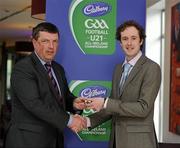 6 May 2011; Tipperary County Board PRO Ger Ryan, left, is presented with a momento by Peter Sweeney, Secretary of the Gaelic Writers Association, after being honoured at the Cadbury Gaelic Writers Association Awards. 2011 Cadbury's Gaelic Writers Association Awards, Louis Fitzgerald Hotel, Clondalkin, Dublin. Picture credit: Brendan Moran / SPORTSFILE