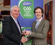 6 May 2011; RTE GAA commentator and Tuam Herald Sports Editor Jim Carney, left, is presented with a momento by Peter Sweeney, Secretary of the Gaelic Writers Association, after being honoured at the Cadbury Gaelic Writers Association Awards. 2011 Cadbury's Gaelic Writers Association Awards, Louis Fitzgerald Hotel, Clondalkin, Dublin. Picture credit: Brendan Moran / SPORTSFILE