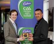 6 May 2011; Former Wexford hurler Martin Storey, right, is presented with a momento by Peter Sweeney, Secretary of the Gaelic Writers Association, after being honoured at the Cadbury Gaelic Writers Association Awards. 2011 Cadbury's Gaelic Writers Association Awards, Louis Fitzgerald Hotel, Clondalkin, Dublin. Picture credit: Brendan Moran / SPORTSFILE