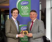 6 May 2011; Former Donegal footballer Martin McHugh, right, is presented with a momento by Peter Sweeney, Secretary of the Gaelic Writers Association, after being honoured at the Cadbury Gaelic Writers Association Awards. 2011 Cadbury's Gaelic Writers Association Awards, Louis Fitzgerald Hotel, Clondalkin, Dublin. Picture credit: Brendan Moran / SPORTSFILE