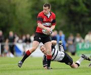 24 April 2011; Colin Hughes, Tullamore RFC, gets past the tackle of Steven McGee, Dundalk RFC. Newstalk Provincial Towns Cup Final, Dundalk RFC v Tullamore RFC, Edenderry RFC, Coolavacoose, Carbury, Co. Kildare. Picture credit: Barry Cregg / SPORTSFILE