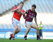 23 April 2011; Ronan Carroll, Louth, in action against Aaron Hoey, Westmeath. Allianz GAA Football Division 3 Final, Louth v Westmeath, Croke Park, Dublin. Picture credit: Barry Cregg / SPORTSFILE