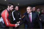 14 December 2016; An Taoiseach Enda Kenny T.D with Derry footballer Chrissy McKaigue in attendance at the GPA agreement with Government on Government grants in Croke Park, Dublin. Photo by Matt Browne/Sportsfile