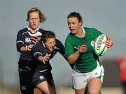 26 February 2011; Lynne Cantwell, Ireland, is tackled by Victoria Blackebrough and Lauren Harris, left, Scotland. Women's Six Nations Rugby Championship, Scotland v Ireland, Lasswade, Edinburgh, Scotland. Picture credit: Stephen McCarthy / SPORTSFILE