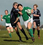26 February 2011; Mairead Kelly, Ireland, is tackled by Annabel Sergeant, Scotland. Women's Six Nations Rugby Championship, Scotland v Ireland, Lasswade, Edinburgh, Scotland. Picture credit: Stephen McCarthy / SPORTSFILE