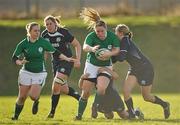 26 February 2011; Geraldine Rae, Ireland, is tackled by Steph Johnston and Annabel Sergeant, right, Scotland. Women's Six Nations Rugby Championship, Scotland v Ireland, Lasswade, Edinburgh, Scotland. Picture credit: Stephen McCarthy / SPORTSFILE