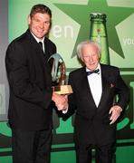 10 May 2011; Johann Muller, left, is presented with the 2010-2011 URSC Player of the Season Award by former Ireland Rugby International player Jack Kyle. Ulster Rugby Awards 2010 - 2011, Culloden Hotel, Belfast, Co. Antrim. Picture credit: John Dickson / SPORTSFILE