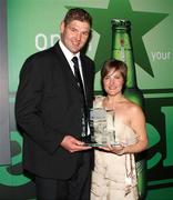 10 May 2011; Johann Muller, left, is presented with the 2010-2011 Heineken Ulster Rugby Personality of the Year Award by Leza Nulty, Commercial Manager, Heineken NI. Ulster Rugby Awards 2010 - 2011, Culloden Hotel, Belfast, Co. Antrim. Picture credit: John Dickson / SPORTSFILE