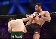 16 December 2016; Richard Kiely, right, lands a knee to defeat Keith McCabe during their welterweight bout at BAMMA 27 in the 3 Arena in Dublin. Photo by Ramsey Cardy/Sportsfile