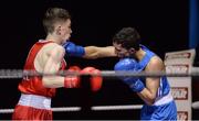 16 December 2016; Stephen McKenna of Ireland, left, in action against Louis Lynn of England during their 56kg bout at the Ireland v England Boxing International in the National Stadium, Dublin. Photo by Piaras Ó Mídheach/Sportsfile