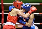16 December 2016; Moira McElligott of Ireland, left, in action against Raven Chapman of England during their 57kg bout at the Ireland v England Boxing International in the National Stadium, Dublin. Photo by Piaras Ó Mídheach/Sportsfile