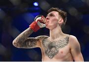 16 December 2016; Rhys McKee celebrates defeating Jai Herbert during their Lonsdale Lightweight Title bout at BAMMA 27 in the 3 Arena in Dublin. Photo by Ramsey Cardy/Sportsfile