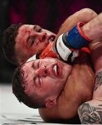 16 December 2016; Tom Duquesnoy submits Alan Philpott during their BAMMA World Bantamweight Title bout at BAMMA 27 in the 3 Arena in Dublin. Photo by Ramsey Cardy/Sportsfile